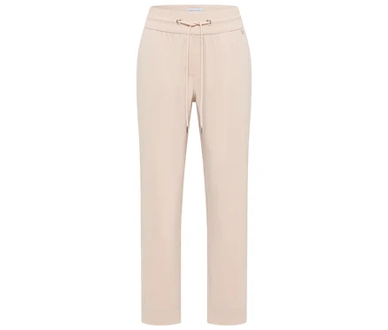 Pantalon de jogging CECIL « Tracey » beige clair avec taille élastique et cordon de serrage.