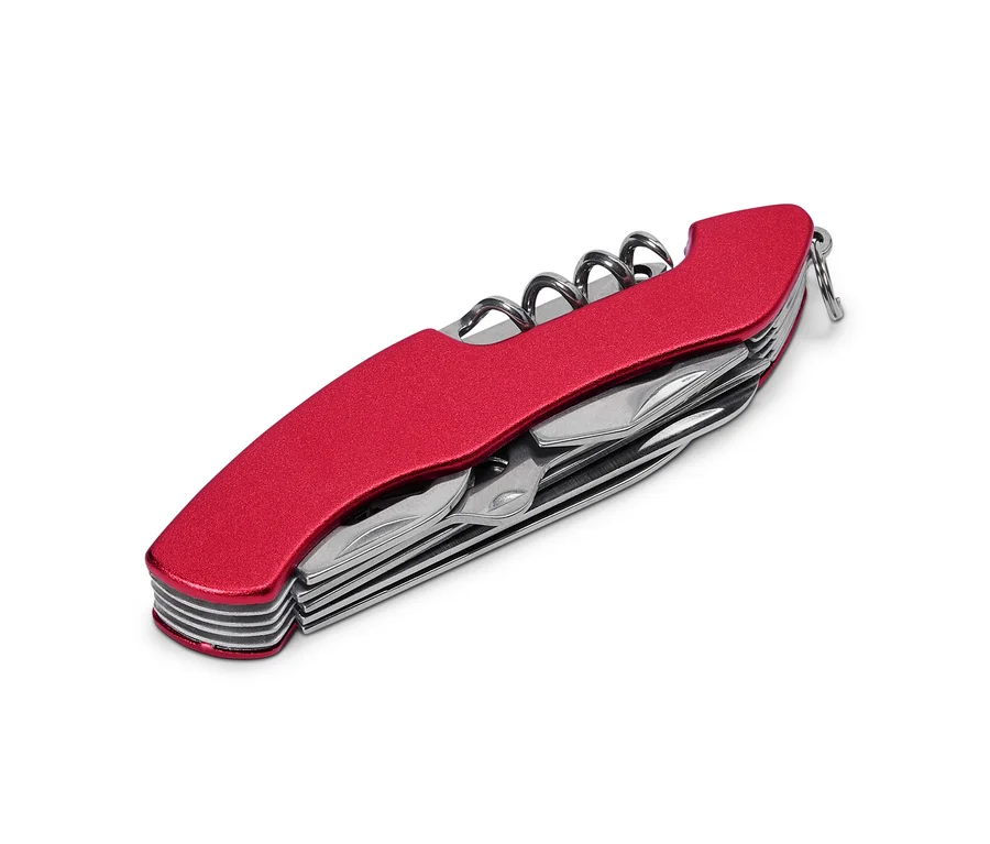 Gros plan d'un couteau suisse rouge avec tire-bouchon et divers outils partiellement sortis.