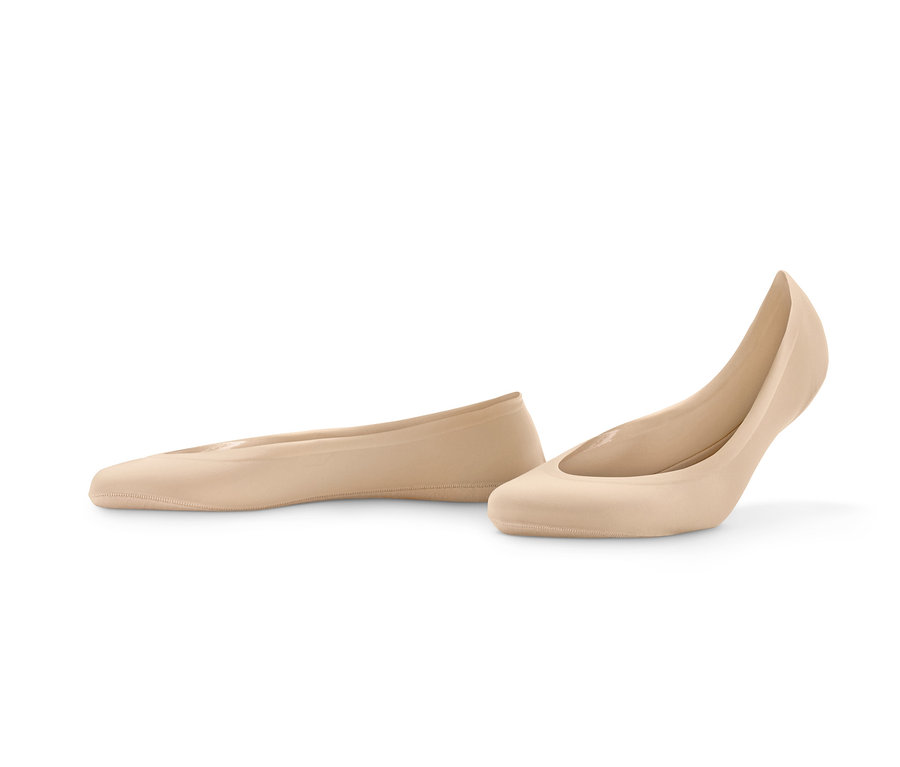 Deux paires de socquettes invisibles Magic Cut, beige et noires.