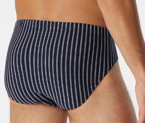 Vue de dos d'un homme portant un slip Supermini SCHIESSER bleu foncé à fines rayures blanches.