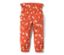 Pantalon élastique orange pour tout-petit avec imprimé à fleurs sur toute la surface.