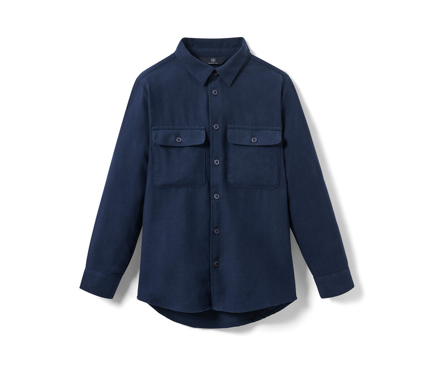 Chemise pour enfant bleu marine à manches longues avec deux poches de poitrine.