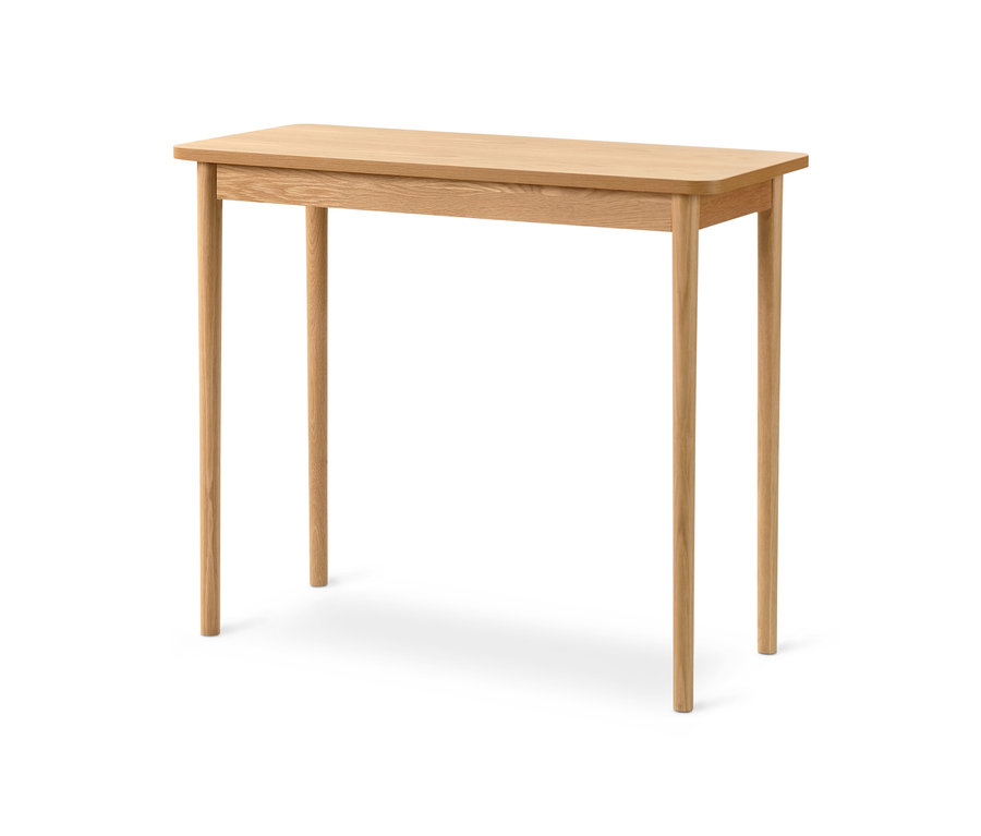Une console en bois clair avec quatre pieds ronds.