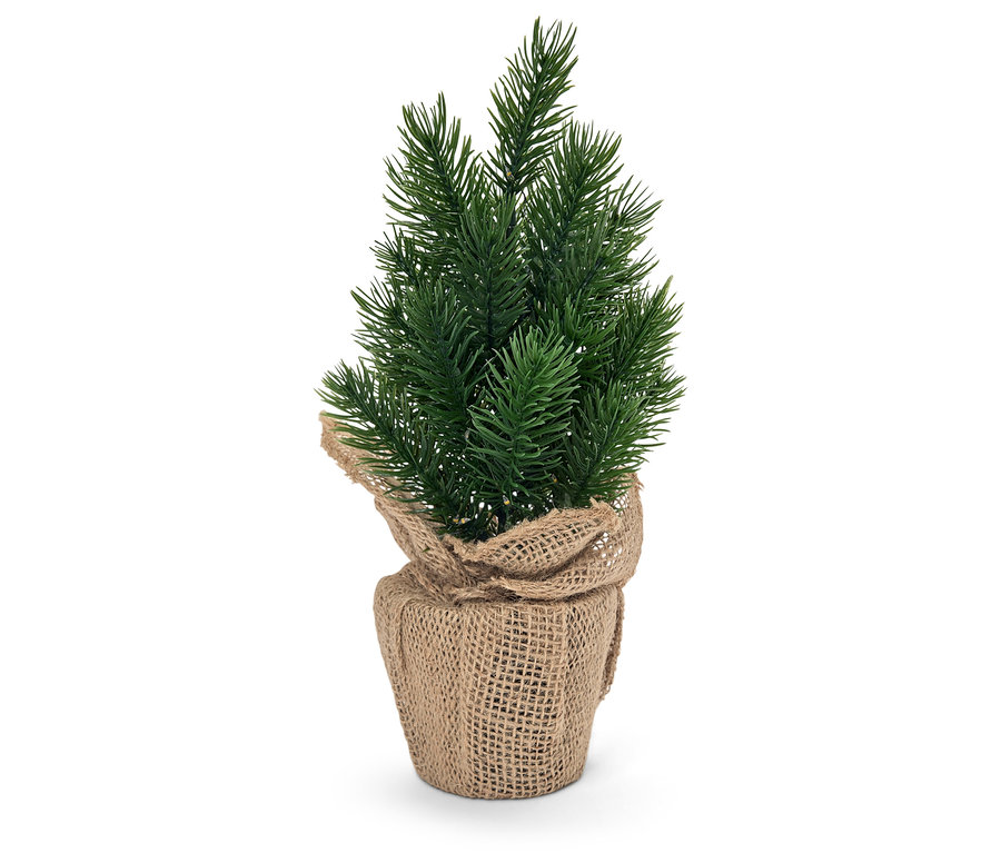Petit sapin de Noël artificiel dans un emballage en jute.