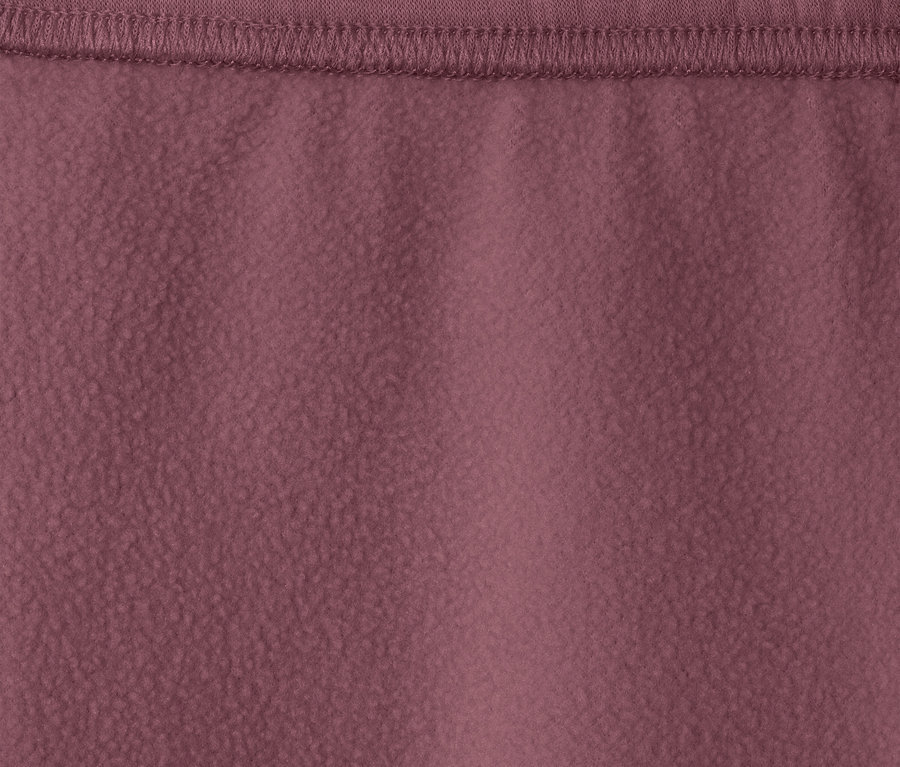 Gros plan sur un legging thermique pour enfant avec intérieur gratté, couleur baies.