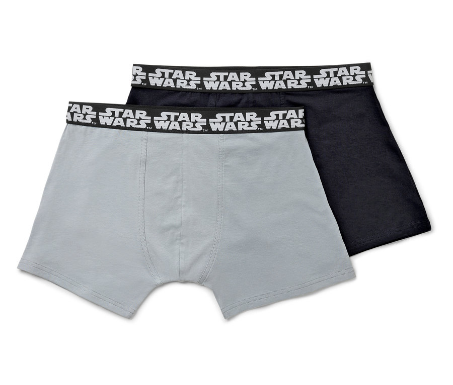 Deux boxers pour hommes : un gris et un noir, tous deux avec l'inscription STAR WARS sur la ceinture.