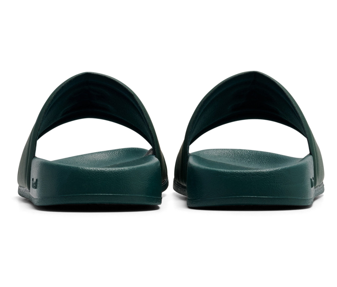 Vue arrière d'une paire de tongs de bain hummel® Pool Slide JR vertes.