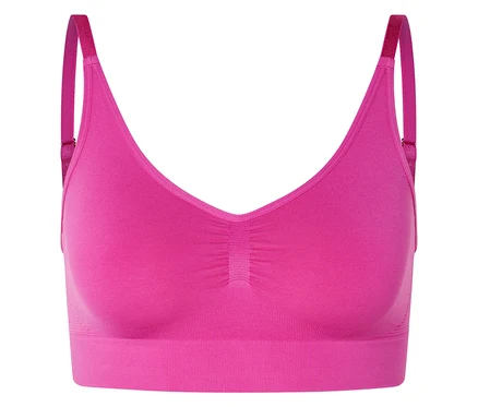 Gros plan d'un soutien-gorge rose avec des bretelles réglables.
