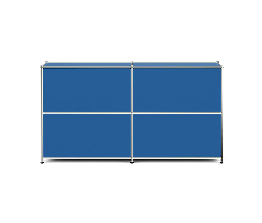 Un meuble de rangement modulaire bleu avec un cadre argenté, composé de quatre compartiments rectangulaires disposés en deux rangées et deux colonnes, sur fond blanc.