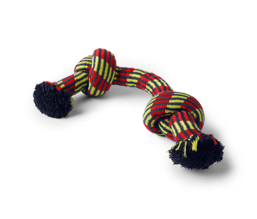 Une corde pour chien avec des noeuds et des franges aux extrémités.