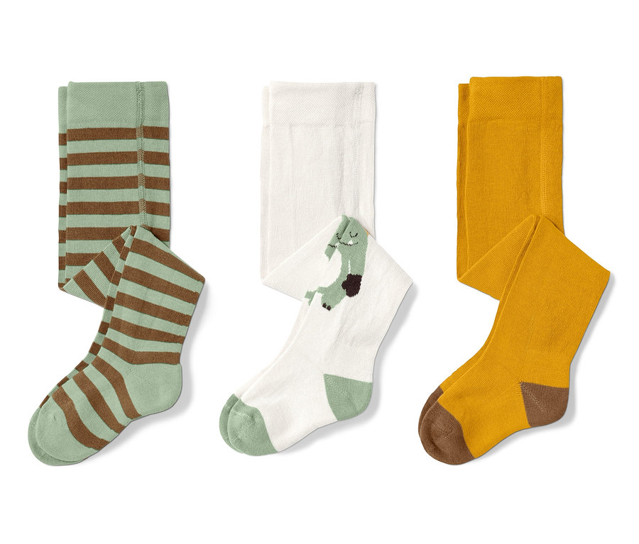 Image de trois paires de collants : vert rayé, blanc avec un motif de dinosaure vert et jaune moutarde avec des orteils marron.