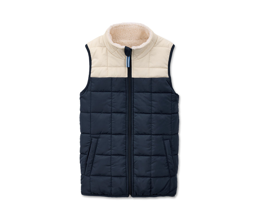 Veste matelassée avec ourlet crème et partie inférieure bleu marine.