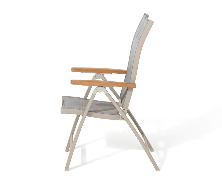 Vue latérale d'une chaise « Liska » avec dossier haut réglable.