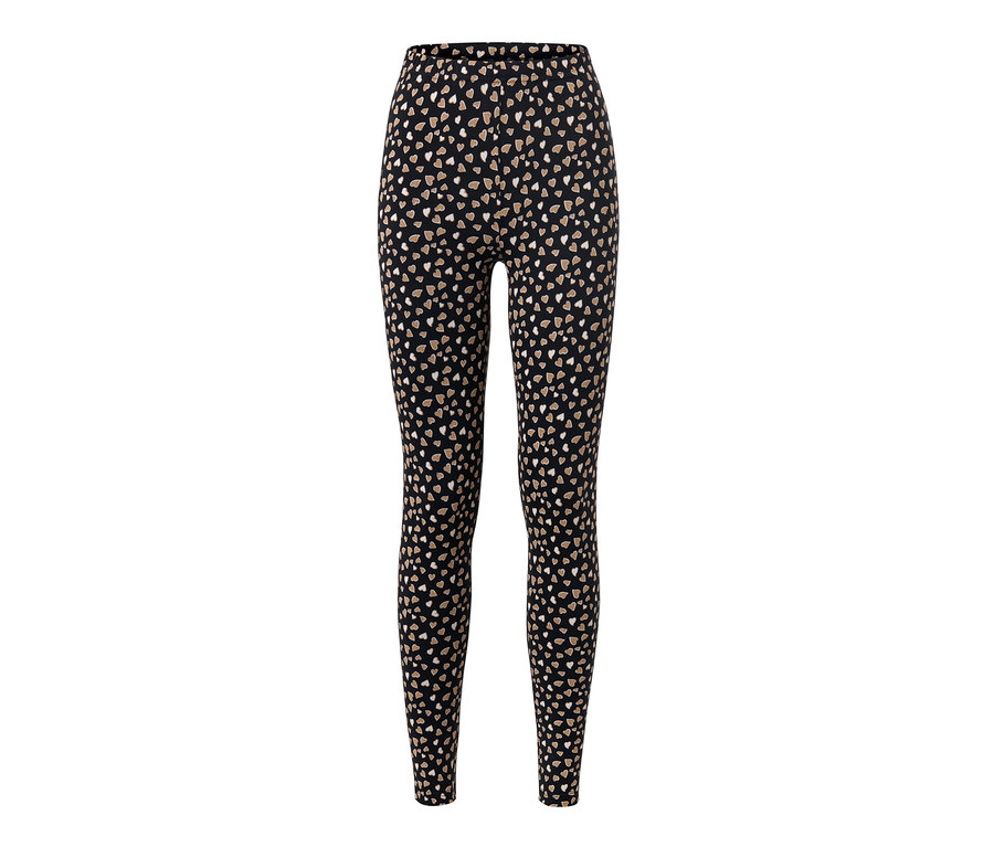 Legging noir à motif intégral de cœurs.