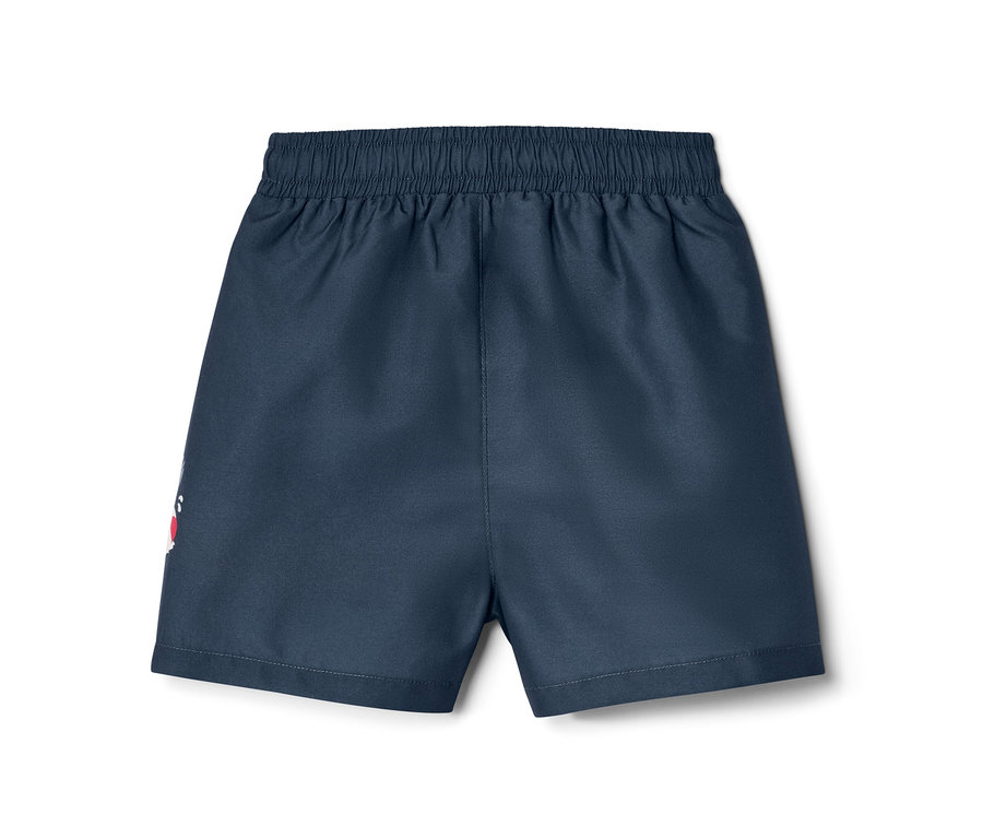 Détail d'un boardshort pour enfant, marin.