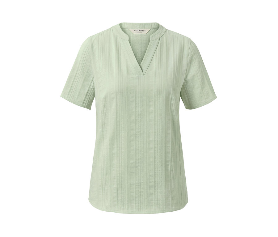 Blouse tissée vert clair avec des manches courtes et un col en V.