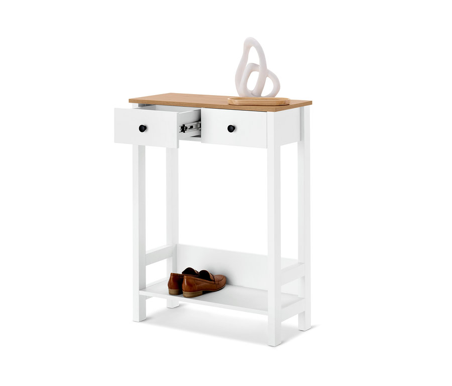 Console blanche avec 2 tiroirs dont un ouvert, avec des chaussures marron sur l'étagère inférieure et une décoration blanche sur le dessus.