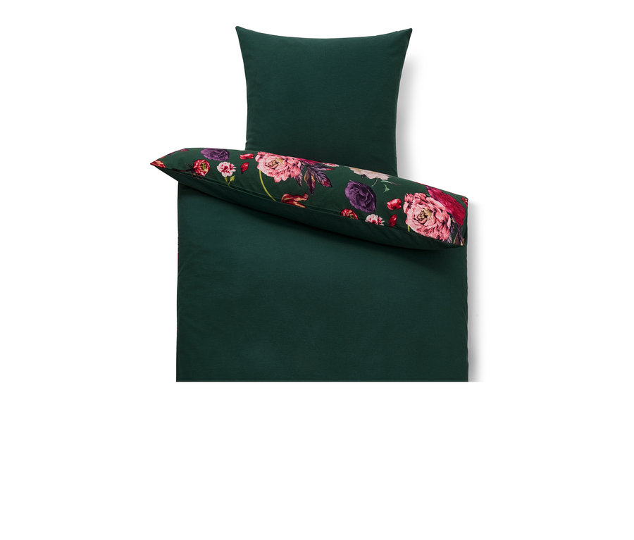 Parure de lit en molleton vert : housse de couette et oreiller, l'oreiller présentant un motif floral.