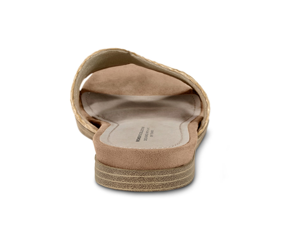 Vue détaillée d'une claquette beige.