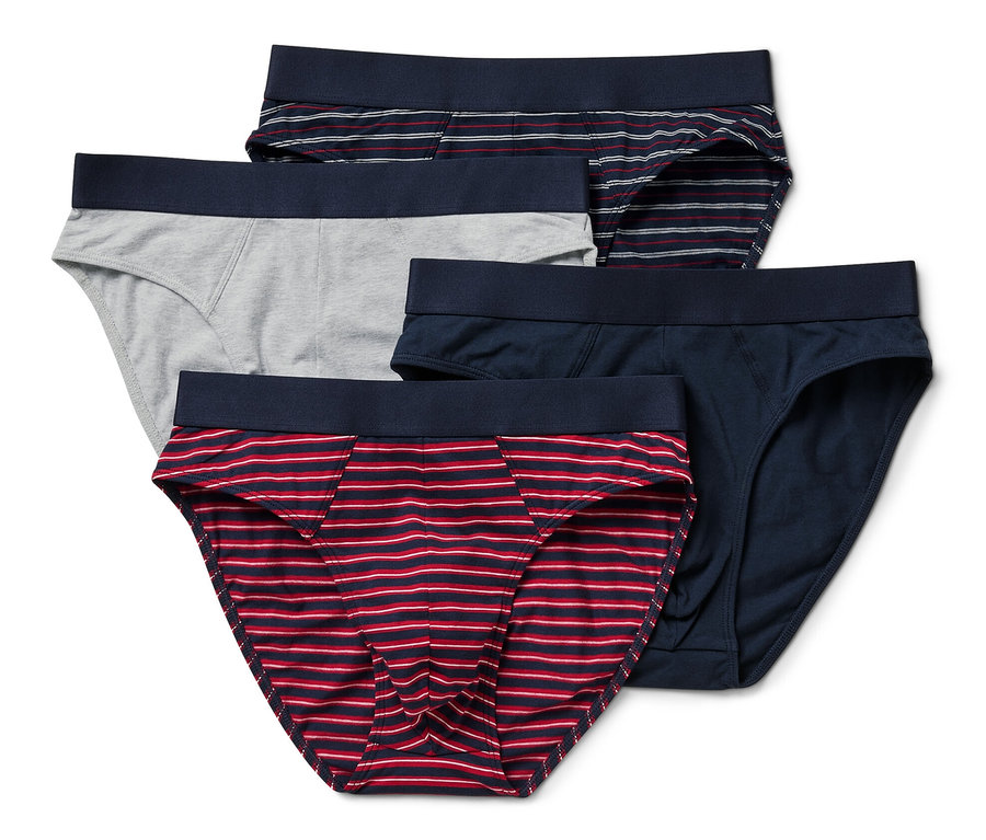 Quatre slips de différentes couleurs et motifs.