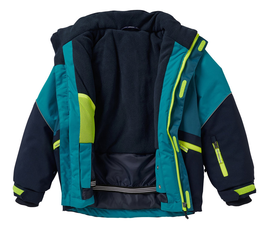 Une veste robuste pour enfant JAKO-O, turquoise foncé, ouverte, posée sur un fond blanc.