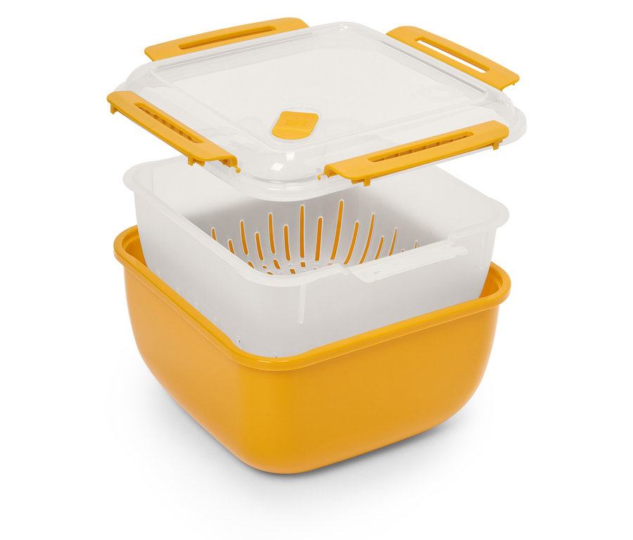 Récipient de cuisine jaune avec passoire et couvercle transparent.