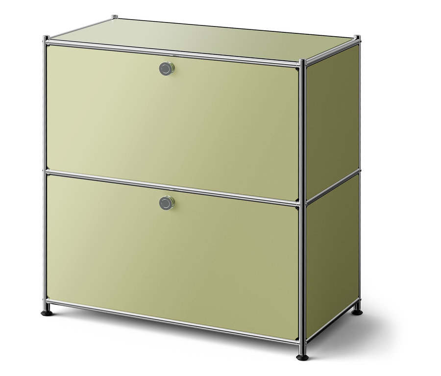 Armoire verte avec deux tiroirs et un cadre argenté.