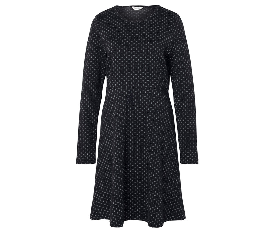 Robe noire à manches longues avec un motif de petites étoiles.
