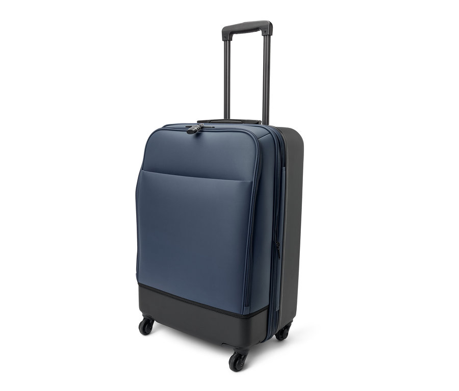 Une valise hybride moyenne sur fond blanc.