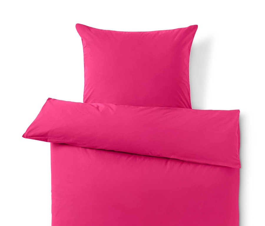 Parure de lit en renforcé rose vif de taille normale avec oreiller.