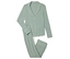 Un pyjama vert avec une bordure blanche posé sur un fond blanc.
