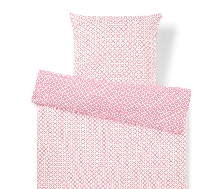 Ensemble de literie avec motif géométrique rose et blanc, comprenant une taie d'oreiller, une couette et un coussin étroit.