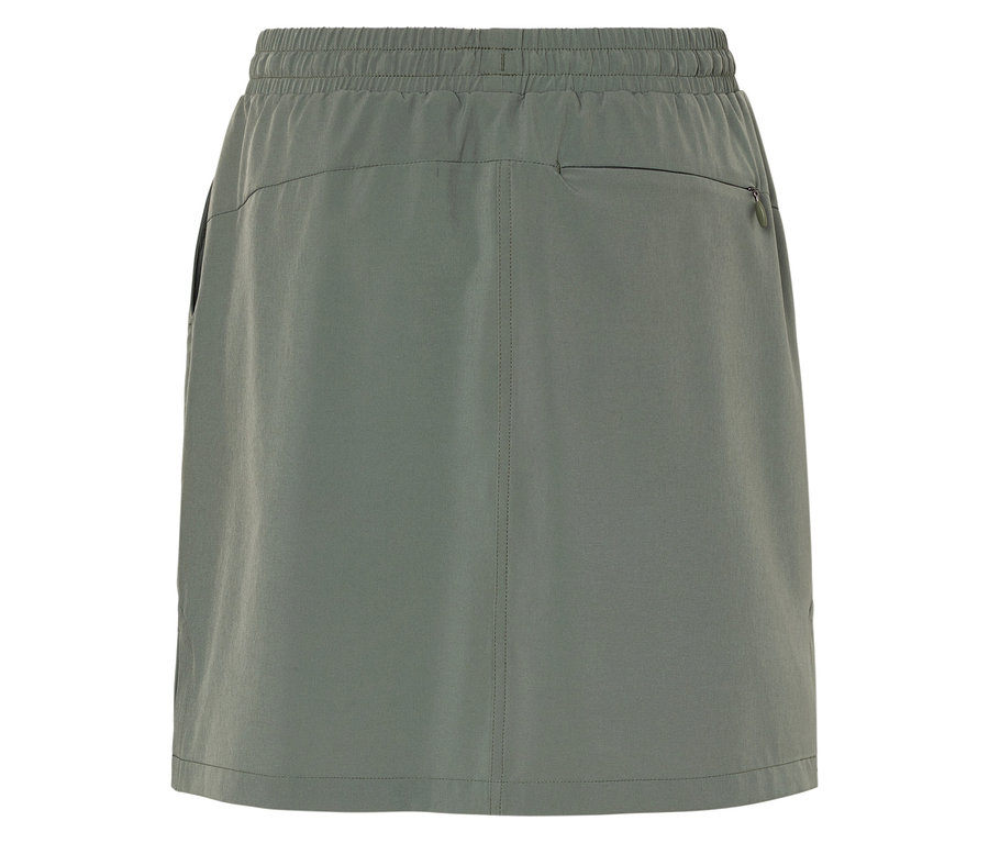 Gros plan d'une jupe vert olive avec une ceinture élastique et une poche zippée.