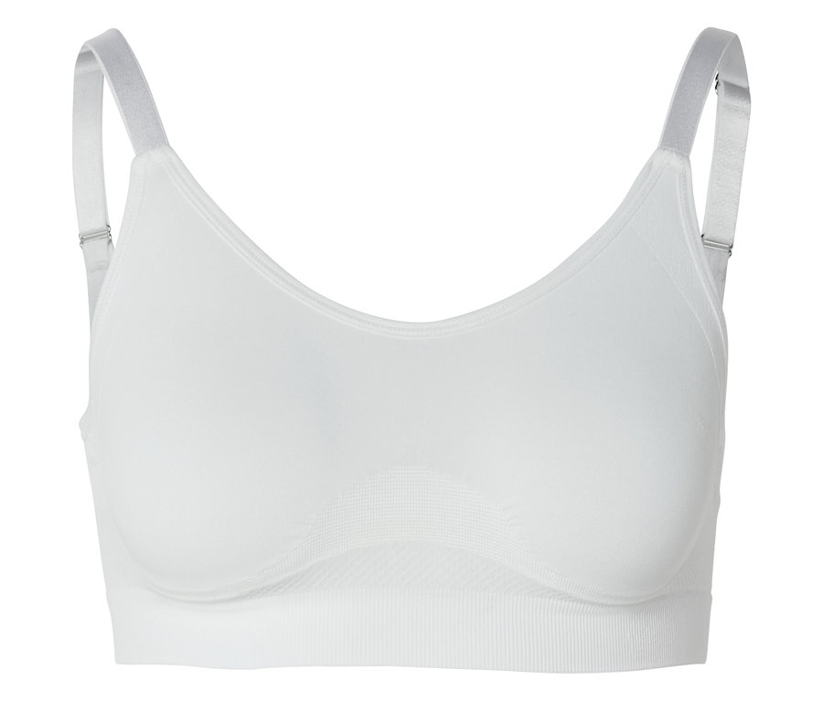 Soutien-gorge de sport blanc avec bretelles réglables et bande élastique sous la poitrine.