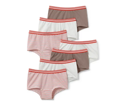 Sept culottes enfant : rayées, marron et blanches, avec une bande rouge à la taille.