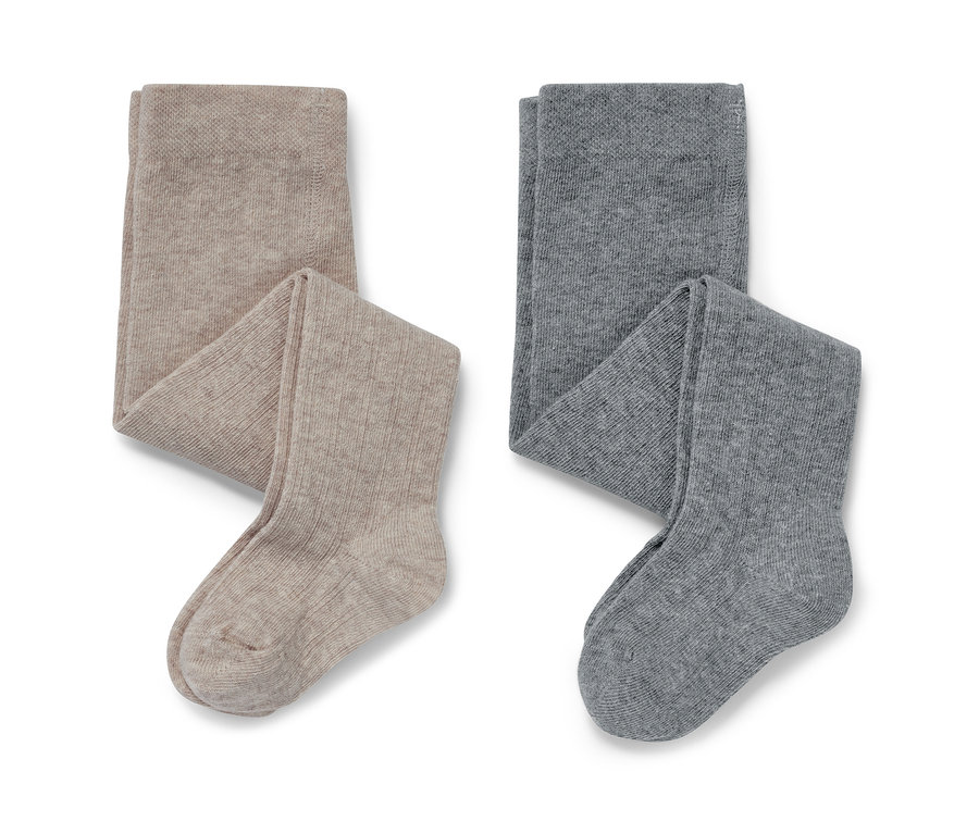 Deux paires de collants pour bébé : beige et gris.