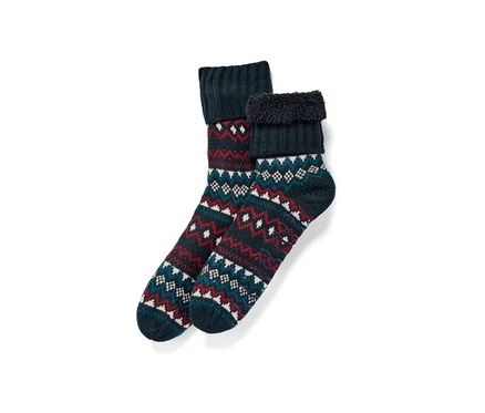 Deux chaussons-chaussettes bleu foncé avec motif norvégien.