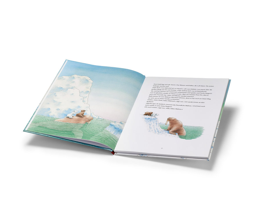 Livre ouvert avec une illustration d'un ours polaire et d'un morse, Livre « Kleiner Eisbär – bärenstarke Geschichten » (en allemand).