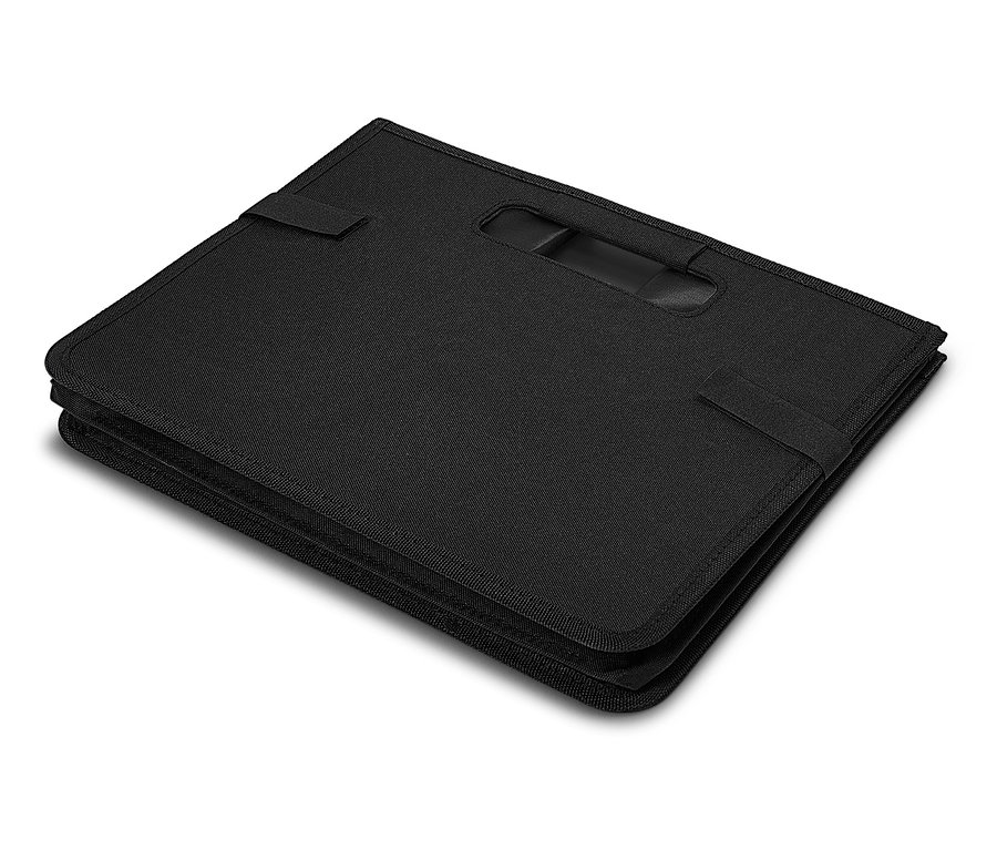 Un sac noir pliable avec une poignée sur fond blanc.