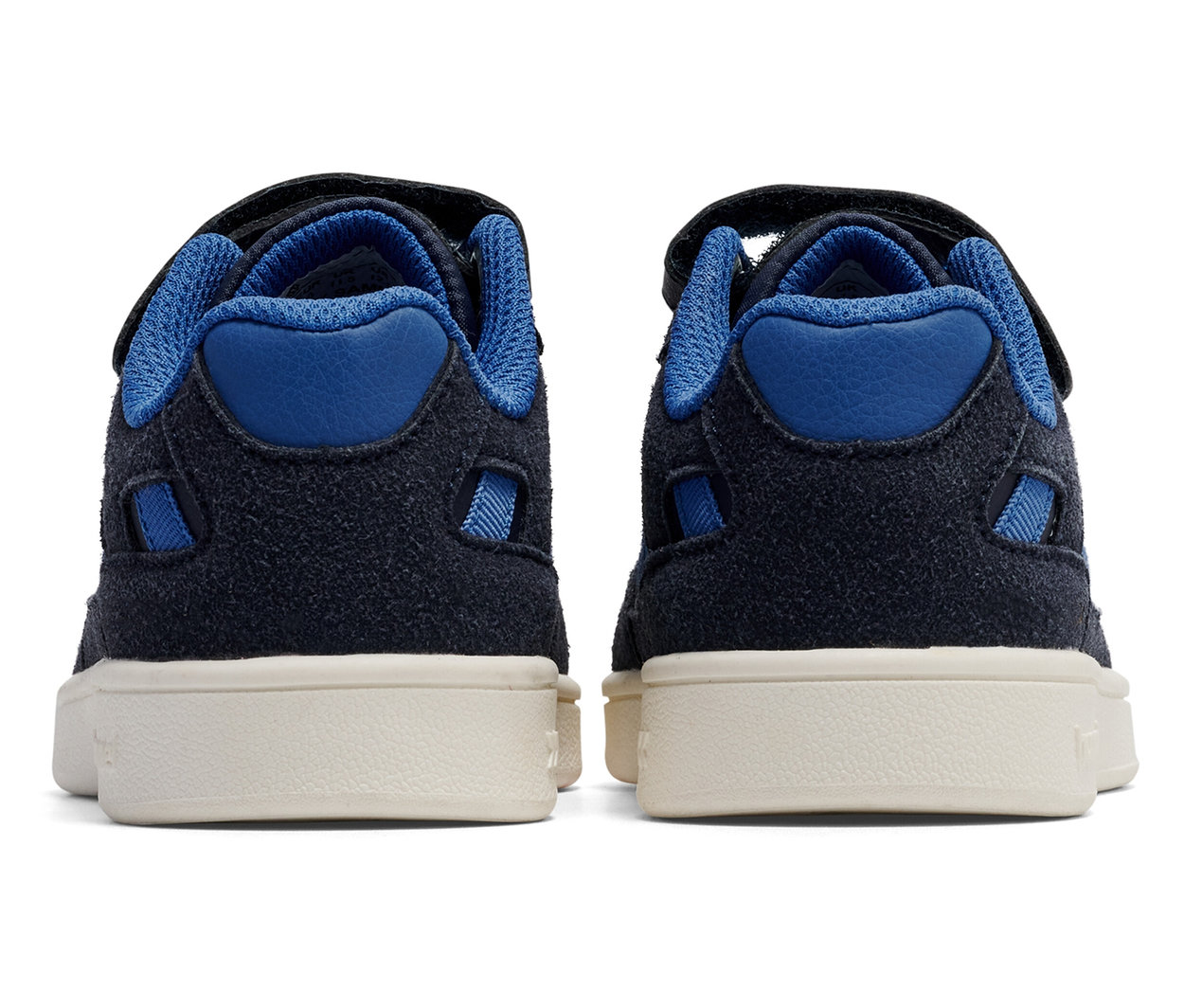 Vue arrière d'une paire de chaussures bleues HUMMEL ST Power play SP Jr.