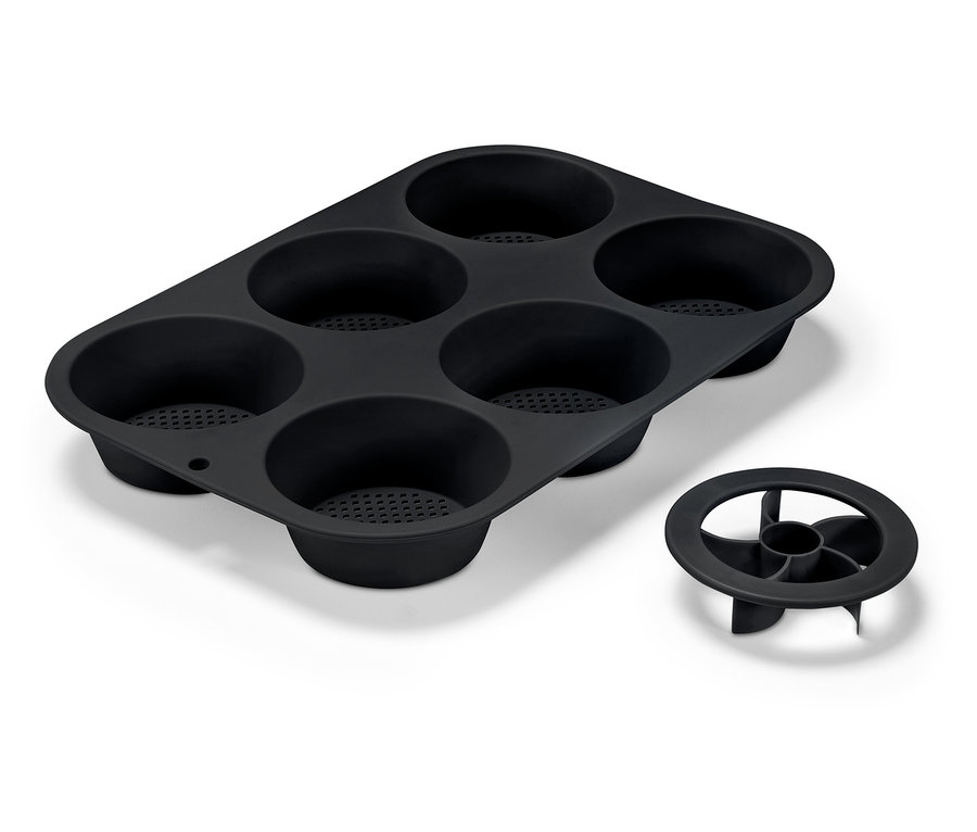 Moule à pâtisserie en silicone noir avec six cavités et fond amovible.