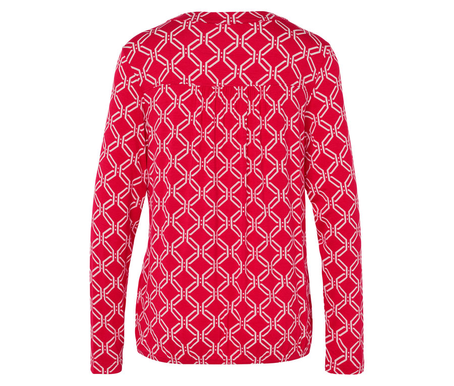 Haut rouge et blanc à manches longues pour femmes avec motif géométrique.