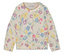 Un cardigan crème pour enfants avec un motif floral jaune, bleu, rose et violet.