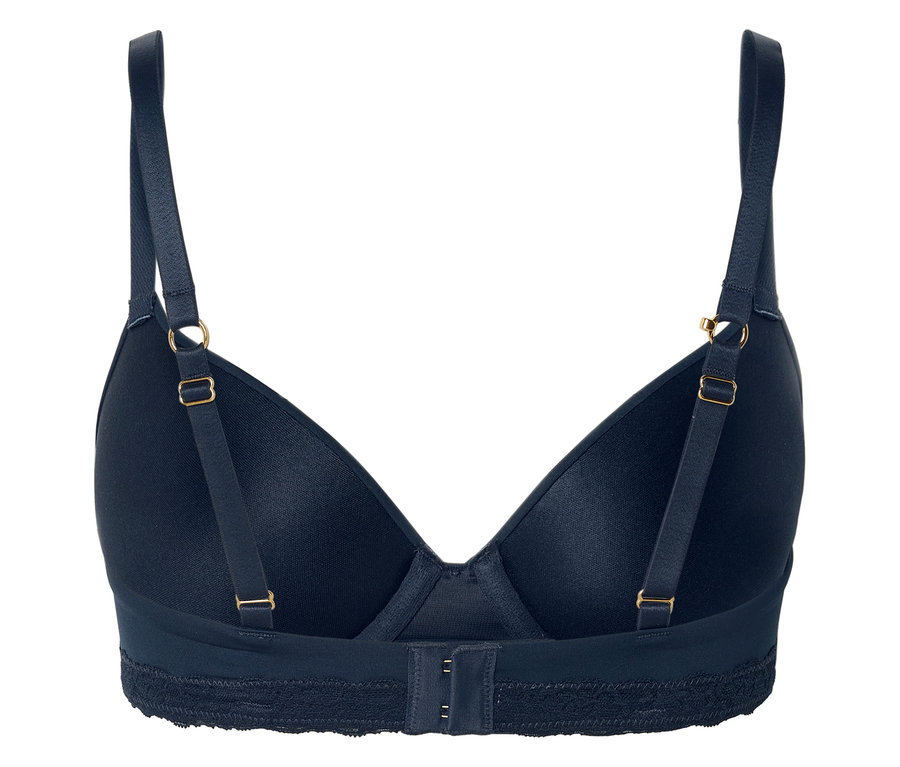 Gros plan sur le dos d'un soutien-gorge bleu marine avec des bretelles réglables et une bande de dentelle.