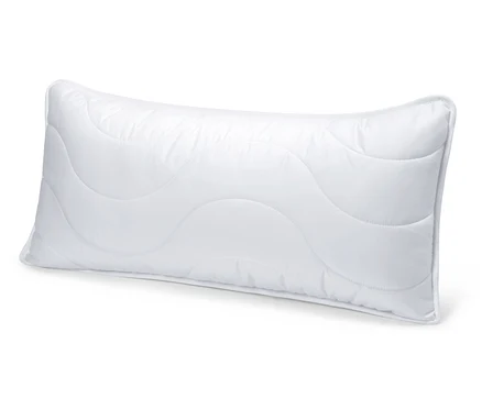 Oreiller blanc lavable à haute température, env. 80 x 40, posé sur un fond blanc.