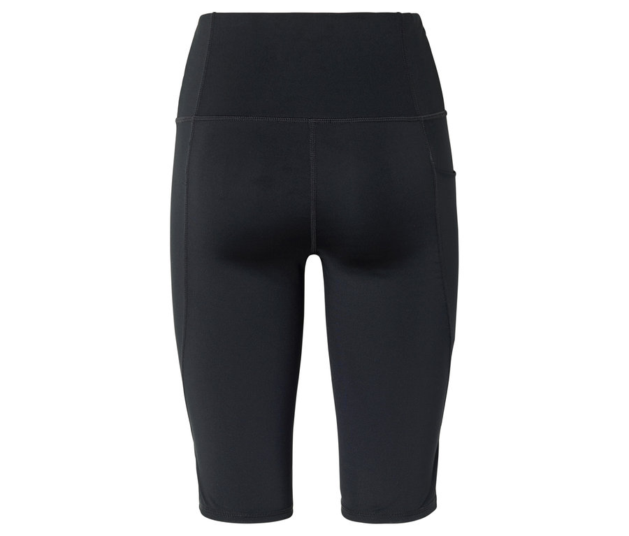 Legging noir taille haute arrivant au genou avec une poche sur le côté droit.