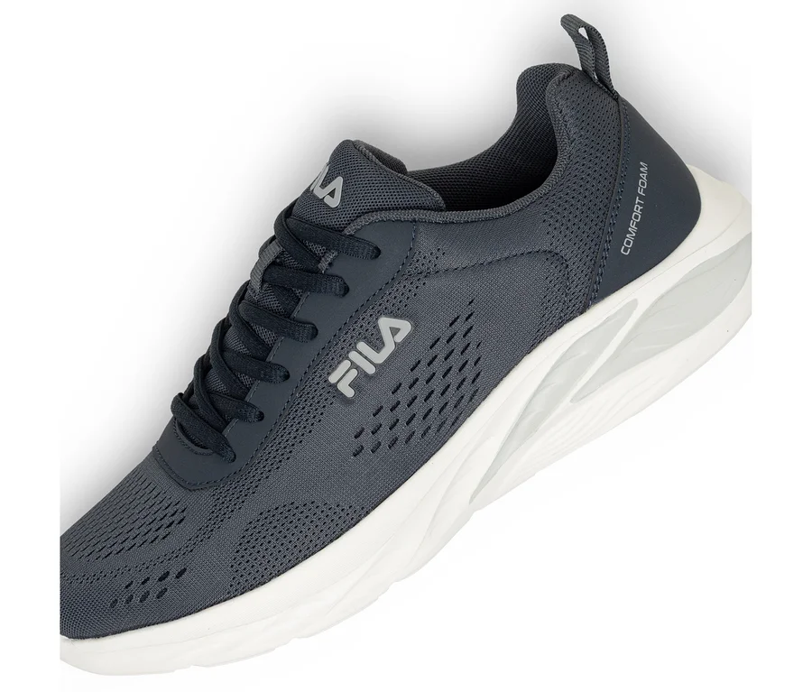 Chaussure de sport Fila gris foncé avec semelle blanche et inscription "Comfort Foam".