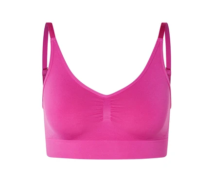 Gros plan d'un soutien-gorge rose avec des bretelles réglables.