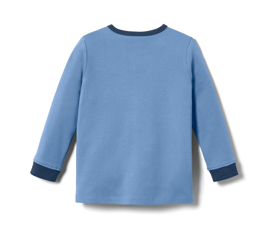 Pyjama interlock bleu pour petits enfants avec manches longues.