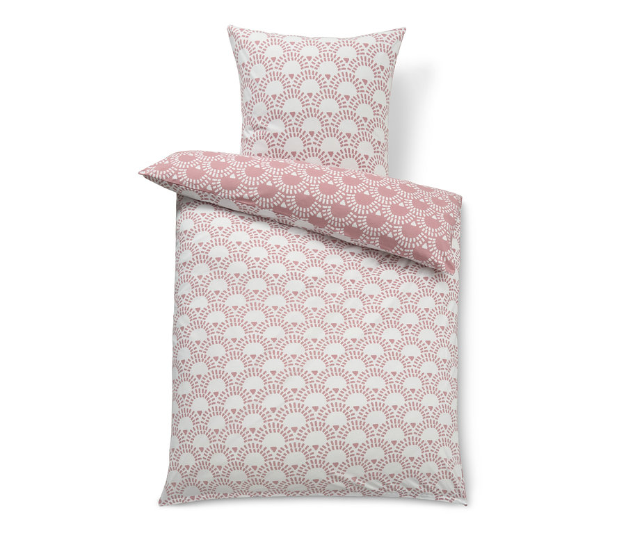 Parure de lit en jersey rose de taille standard avec motif géométrique.